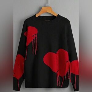 Black sweater with hearts